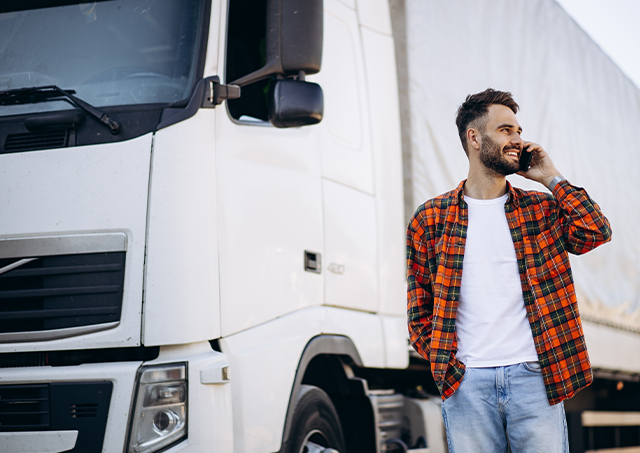 Competitive heavy vehicle finance solutions helping a young driver acquire a new white Volvo semi-truck